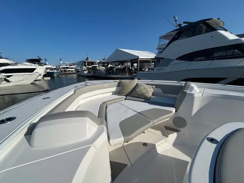 Slide: The Image of Luxurious 2026 Scout 435 LXF boat in marina. - 9