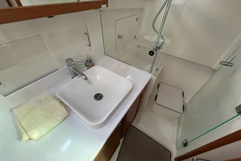 Slide: The Image of Luxurious bathroom in 2022 Back Cove 39O yacht with modern sink and shower. - 20