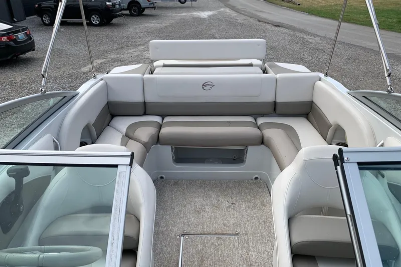 Slide: The Image of 2018 Crownline 205 SS boat interior with spacious seating and modern design. - 14