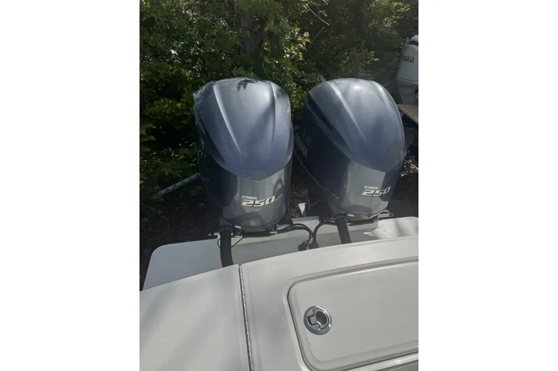 Slide: The Image of Twin Yamaha 250 outboard engines on a 2021 Regulator 25 boat. - 10