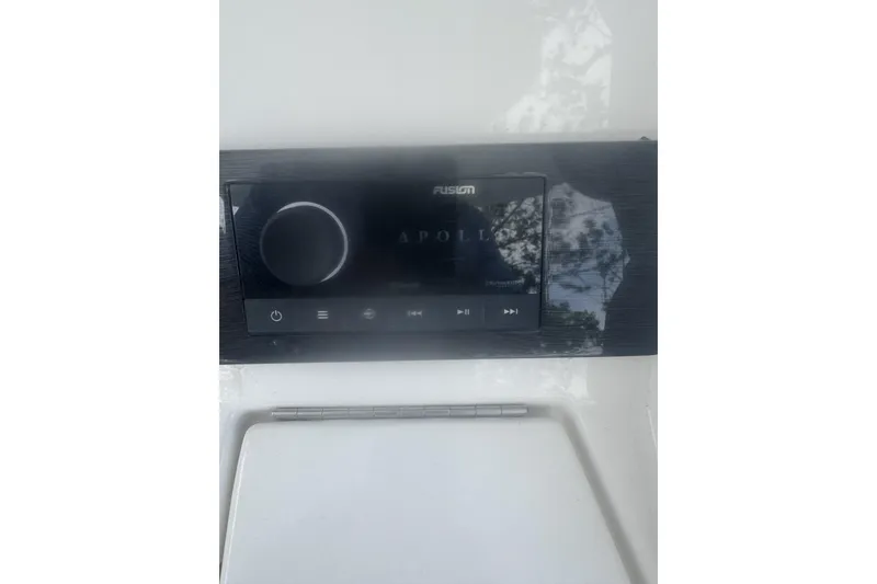 Slide: The Image of Fusion Apollo stereo system on 2021 Regulator 25 boat dashboard. - 4