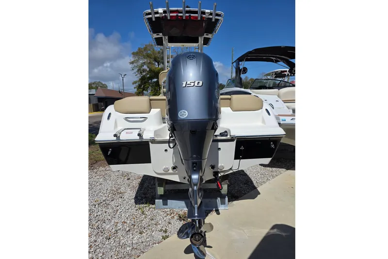 Slide: The Image of 2019 Key West 203 FS boat with 150 HP outboard motor, rear view. - 12