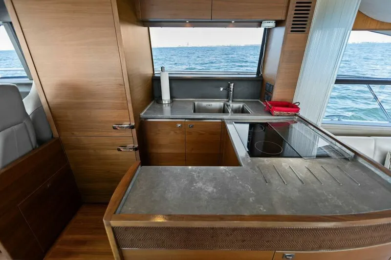 Slide: The Image of Modern kitchen on 2016 Princess 60 Flybridge yacht with ocean view. - 13