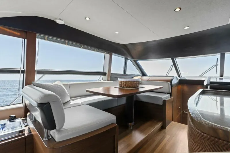 Slide: The Image of Luxurious interior of 2016 Princess 60 Flybridge yacht with elegant dining area. - 18