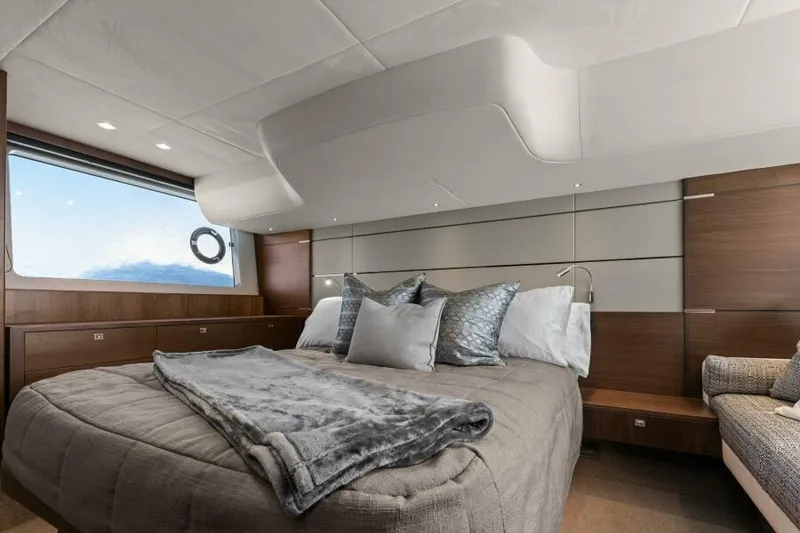 Slide: The Image of Luxurious bedroom interior of 2016 Princess 60 Flybridge yacht with elegant bedding. - 2