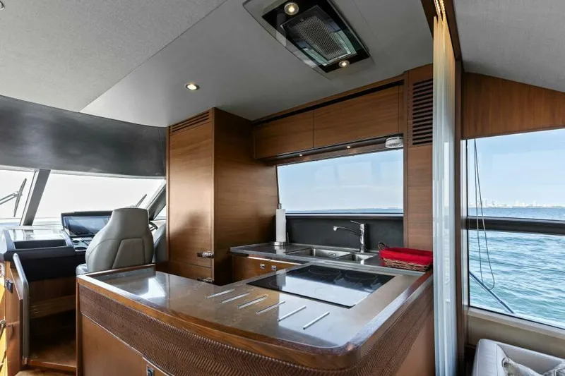 Slide: The Image of Luxurious kitchen interior of 2016 Princess 60 Flybridge yacht with ocean view. - 25