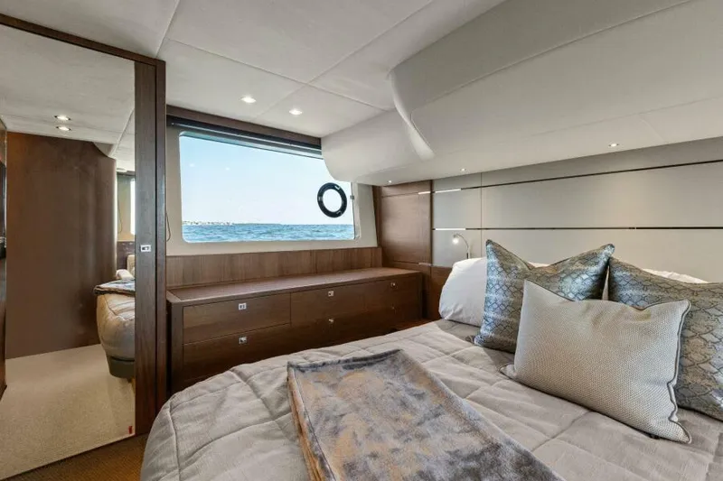 Slide: The Image of Luxurious bedroom interior of 2016 Princess 60 Flybridge yacht with ocean view. - 35