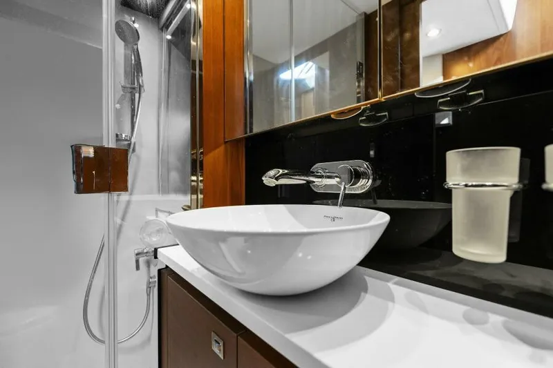 Slide: The Image of Luxurious bathroom in 2016 Princess 60 Flybridge yacht with modern sink and shower. - 40