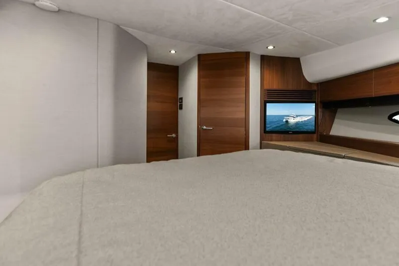 Slide: The Image of Luxurious cabin interior of 2016 Princess 60 Flybridge yacht with modern wood finishes. - 43