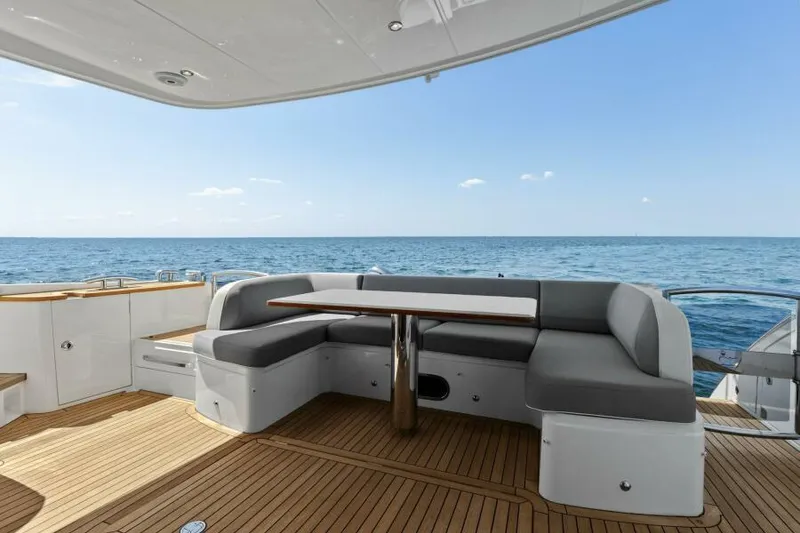 Slide: The Image of Luxurious 2016 Princess 60 Flybridge yacht with elegant seating and ocean view. - 9