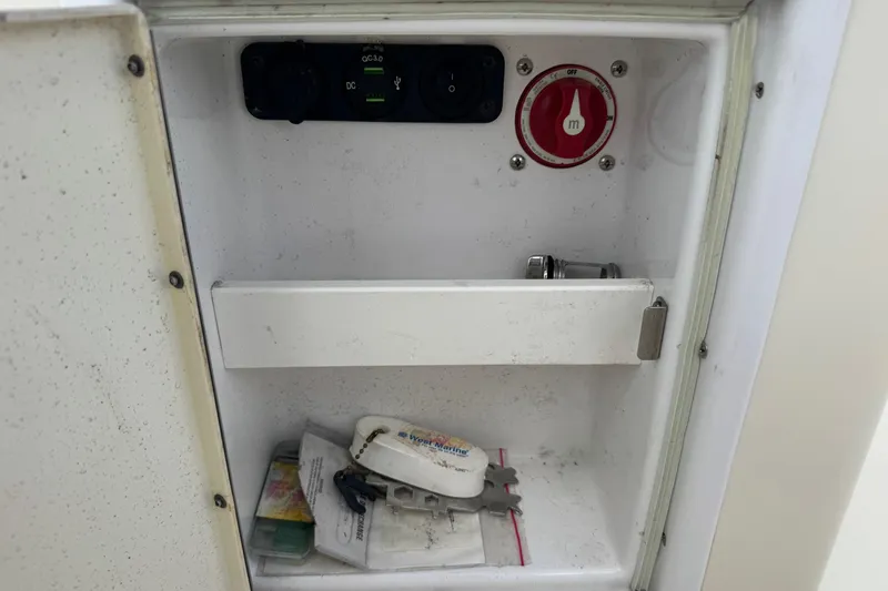 Slide: The Image of Interior of a 1991 Hoog Comet 14 compartment with controls and miscellaneous items. - 10