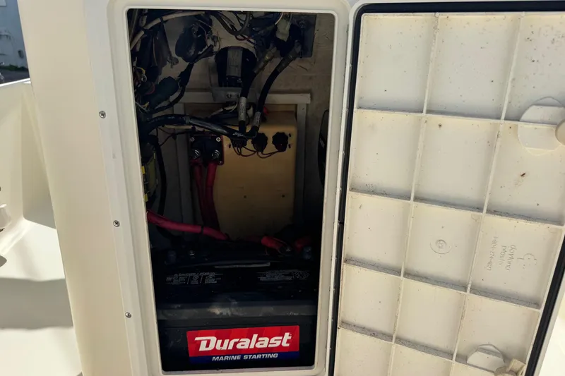 Slide: The Image of Battery compartment of a 1991 Hoog Comet 14 with Duralast marine battery. - 13