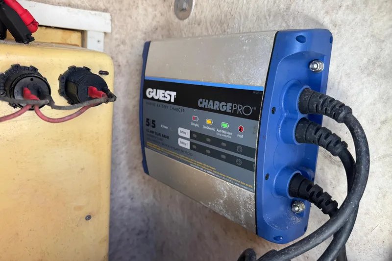 Slide: The Image of Guest ChargePro marine battery charger installed on a 1991 Hoog Comet 14 boat. - 14