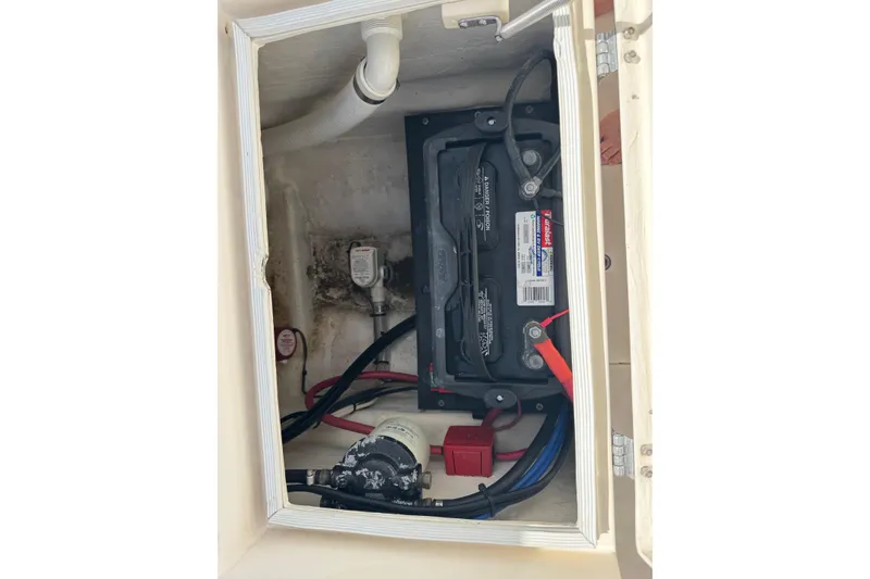 Slide: The Image of Battery compartment of 1991 Hoog Comet 14 with wiring and components. - 21