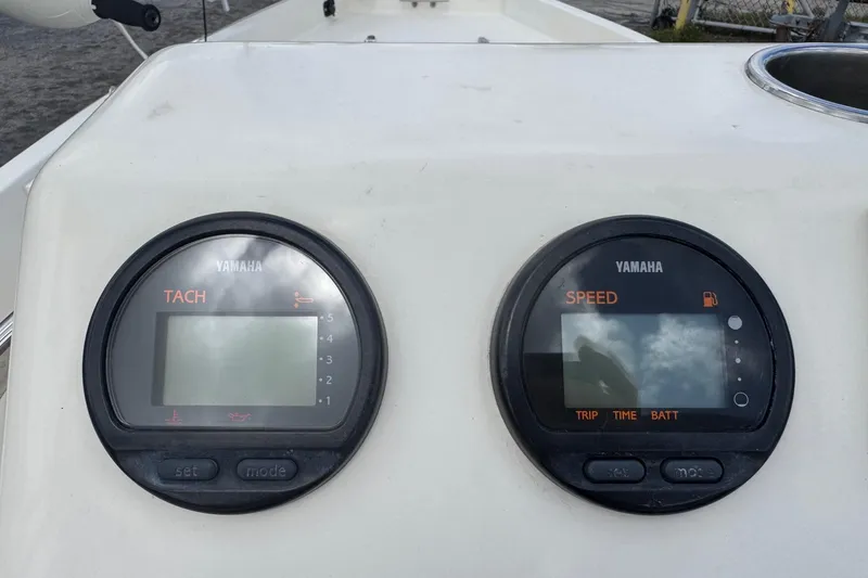 Slide: The Image of Yamaha tachometer and speedometer on 1991 Hoog Comet 14 boat dashboard. - 7