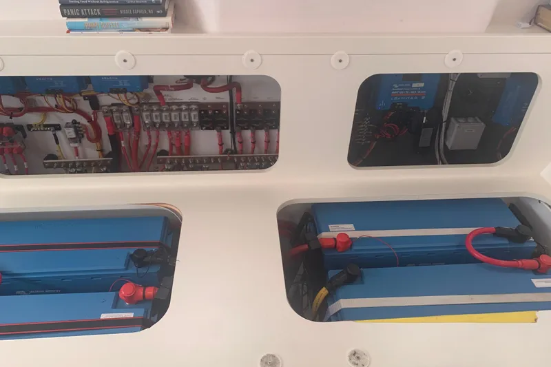 Slide: The Image of Electrical system and batteries inside a 2020 Outremer 51 catamaran. - 101