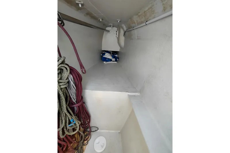 Slide: The Image of Storage compartment with ropes in a 2020 Outremer 51 sailboat. - 104