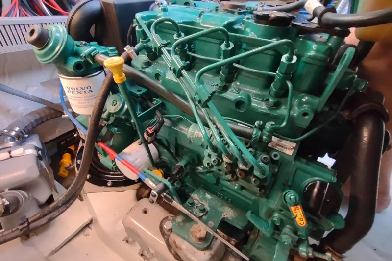 Slide: The Image of Volvo Penta engine in a 2020 Outremer 51 catamaran, showcasing detailed components. - 113
