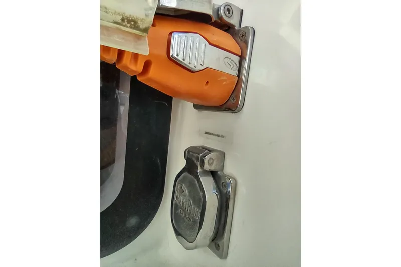Slide: The Image of Outremer 51 (2020) boat detail showing electrical connection and plug. - 118