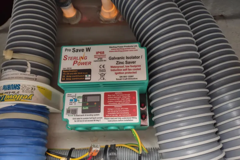 Slide: The Image of Electrical components in an Outremer 51 yacht, featuring Sterling Power Pro Save W and galvanic isolator. - 121