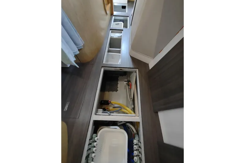 Slide: The Image of Interior view of 2020 Outremer 51 yacht showing underfloor storage compartments. - 125