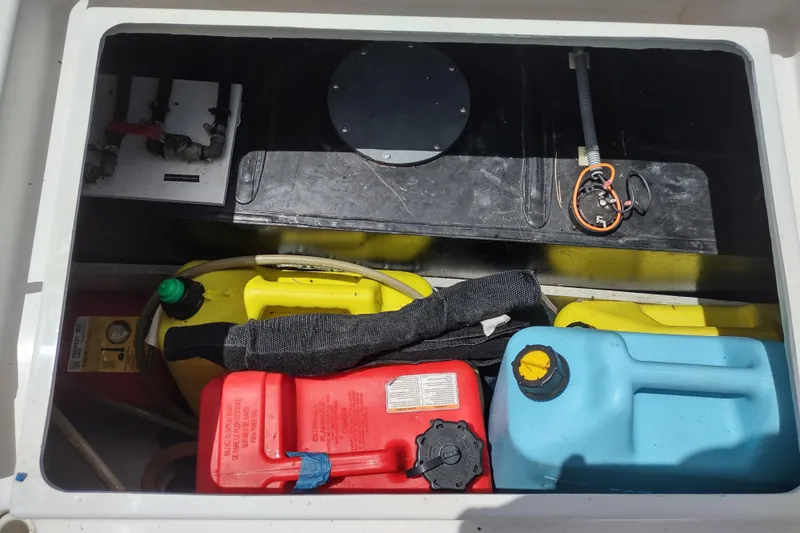 Slide: The Image of Storage compartment of 2020 Outremer 51 with fuel containers and equipment. - 136