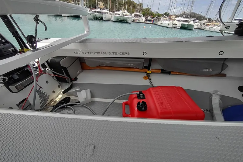 Slide: The Image of 2020 Outremer 51 yacht interior with red fuel container, docked in marina. - 137
