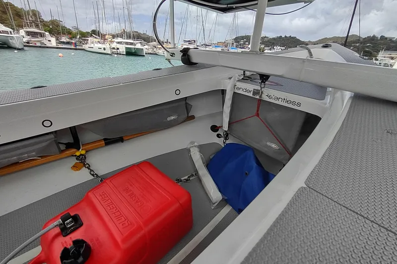 Slide: The Image of 2020 Outremer 51 sailboat interior with storage and equipment, docked at marina. - 138