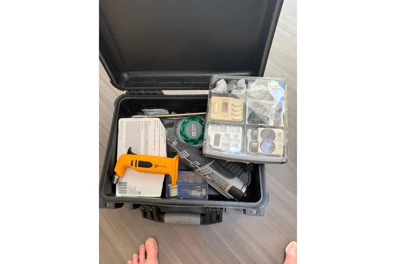 Slide: The Image of Open toolbox with assorted tools and accessories on a 2020 Outremer 51 yacht. - 149