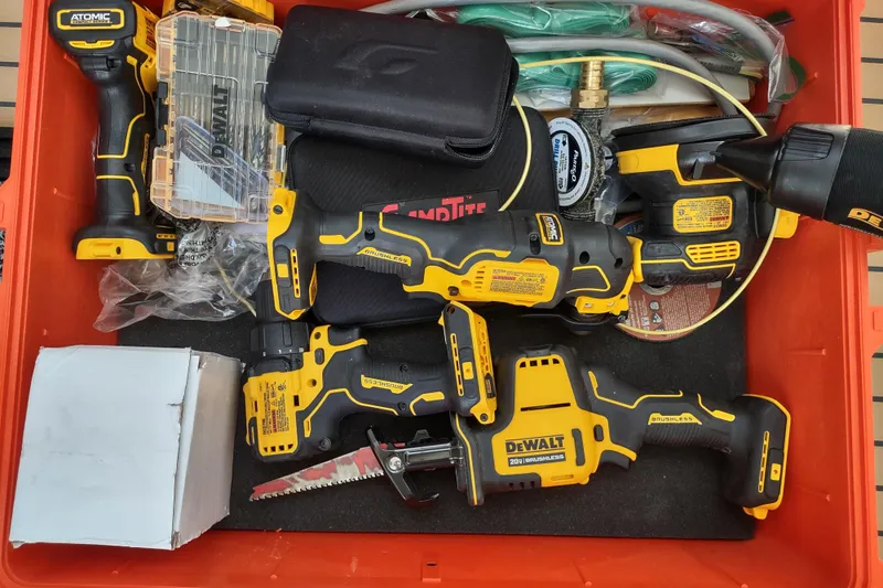 Slide: The Image of Toolbox with DeWalt power tools and accessories on an Outremer 51, 2020 model. - 166