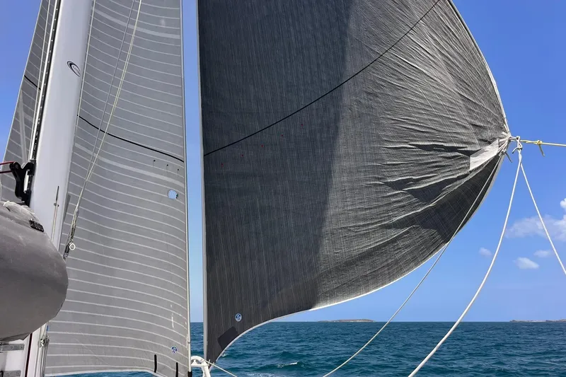 Slide: The Image of Outremer 51 sailboat, 2020 model, sailing on open sea with clear blue sky. - 17
