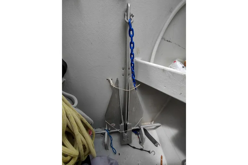Slide: The Image of Anchor and ropes in a 2020 Outremer 51 sailboat storage compartment. - 173