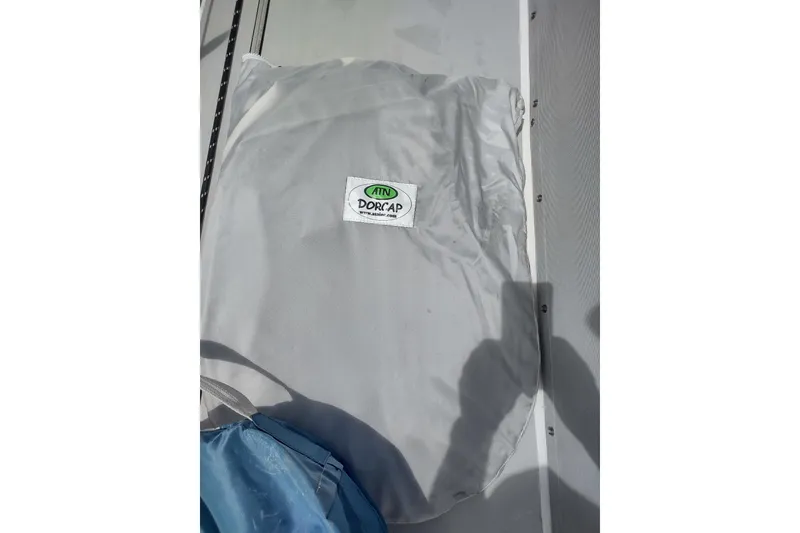 Slide: The Image of ATN Dorcap cover on 2020 Outremer 51 sailboat, featuring a gray protective fabric. - 174