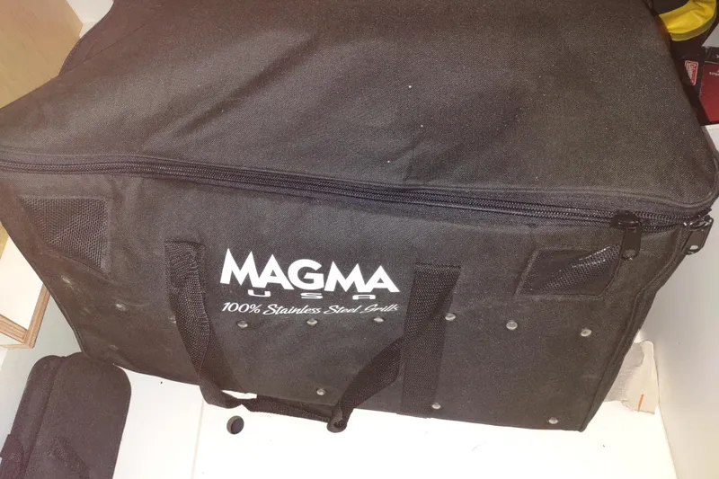 Slide: The Image of Black Magma grill bag on Outremer 51, 2020 model, featuring stainless steel construction. - 181
