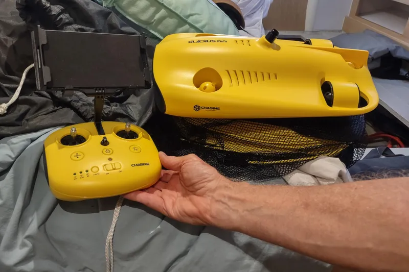Slide: The Image of Yellow underwater drone and remote control on Outremer 51, 2020 model. - 183