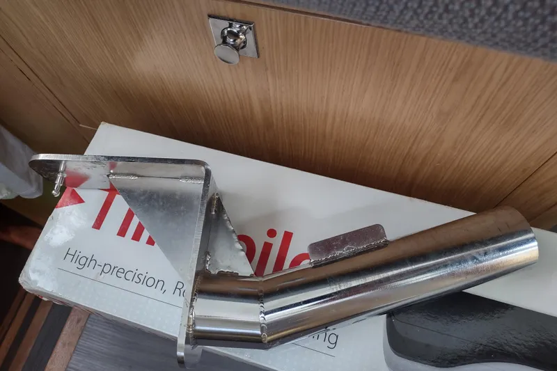Slide: The Image of Stainless steel boat part on Outremer 51, 2020 model, resting on a box. - 185