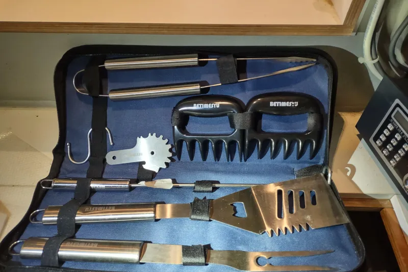 Slide: The Image of Barbecue tool set in a case on an Outremer 51, 2020 model. - 187
