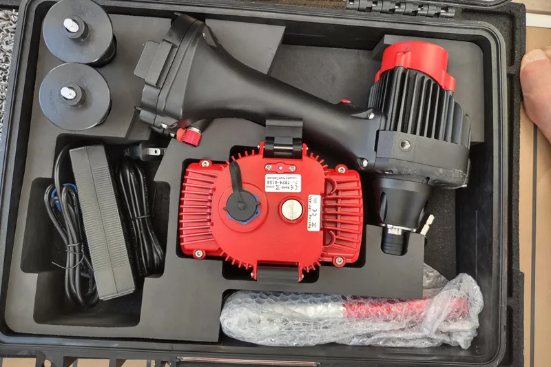 Slide: The Image of High-tech equipment in a protective case, featuring red and black components, Outremer 51, 2020 model. - 190