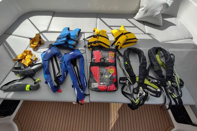 Slide: The Image of Safety gear on Outremer 51 yacht, including life jackets and harnesses, 2020 model. - 194