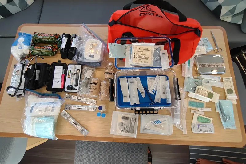 Slide: The Image of First aid kit contents on Outremer 51 yacht, 2020 model, displayed on a table. - 197