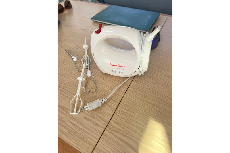 Slide: The Image of Electric hand mixer on wooden table, Outremer 51, 2020 model. - 204