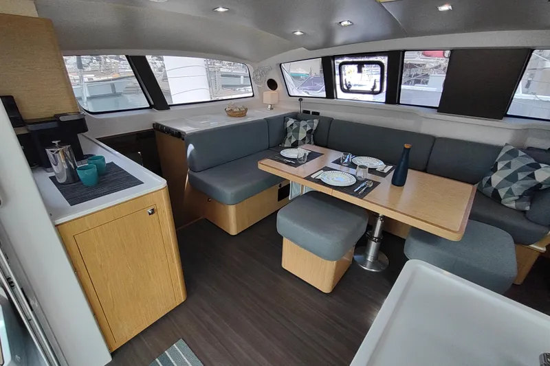 Slide: The Image of Modern interior of 2020 Outremer 51 catamaran with dining area and kitchenette. - 47