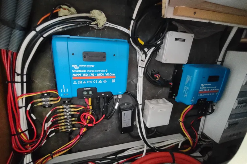 Slide: The Image of Electrical setup with Victron Energy SmartSolar charge controllers on a 2020 Outremer 51. - 97