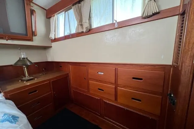 Slide: The Image of Master Stateroom's Abundant Storage & Natural Light - 65