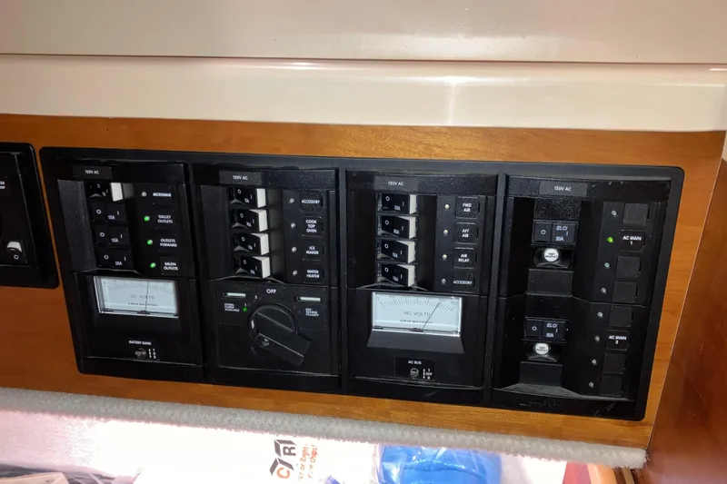 Slide: The Image of Electrical control panel on a 2017 Cutwater C-30 Sedan boat. - 30