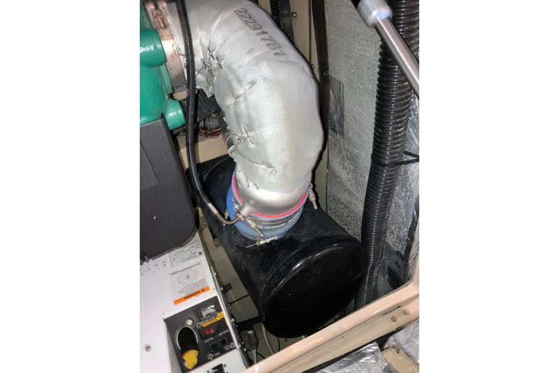 Slide: The Image of Engine compartment of a 2017 Cutwater C-30 Sedan boat, showing insulated components. - 91