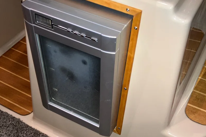Slide: The Image of 2017 Cutwater C-30 Sedan interior with built-in stainless steel appliance. - 43