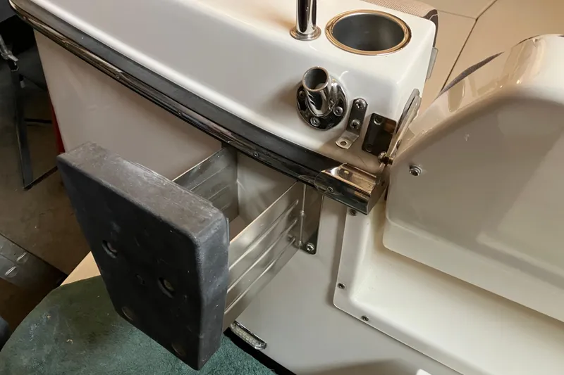 Slide: The Image of 2017 Cutwater C-30 Sedan boat interior detail with seating and control panel. - 105