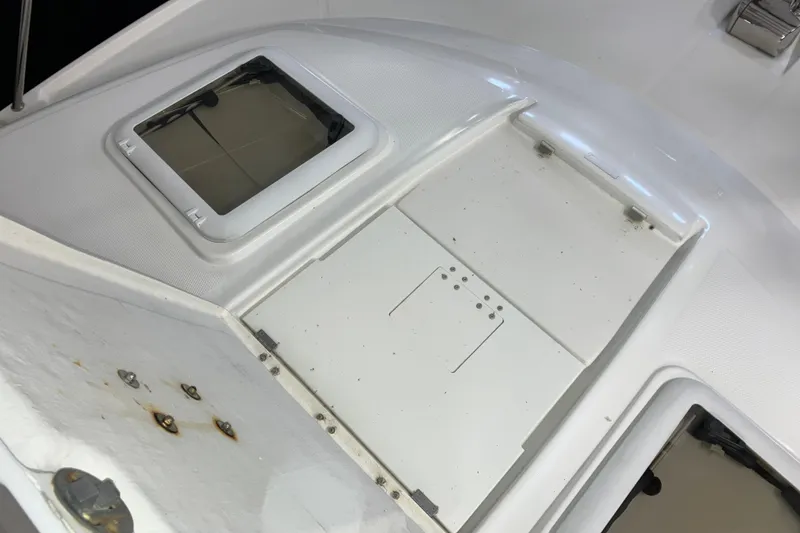 Slide: The Image of 2017 Cutwater C-30 Sedan boat deck with hatches and fittings. - 98