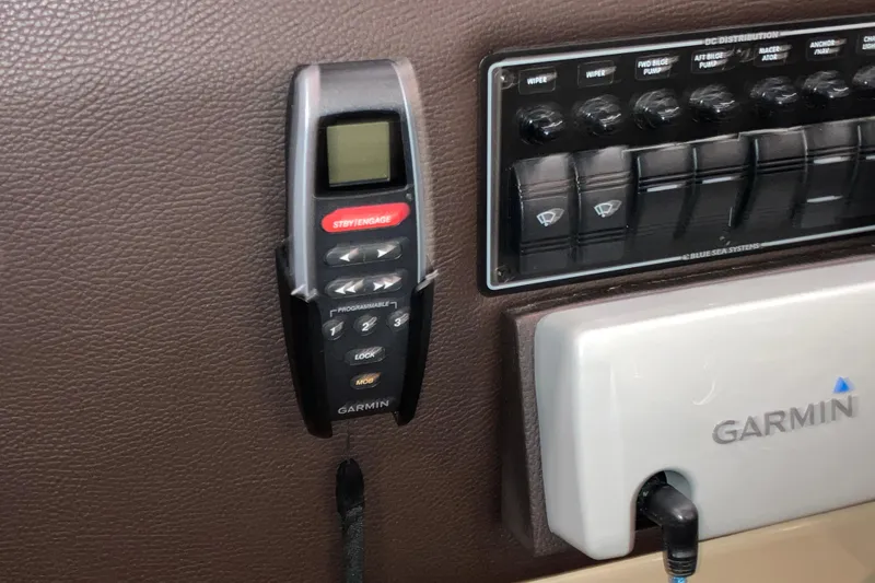 Slide: The Image of Garmin control panel on 2017 Cutwater C-30 Sedan boat dashboard. - 64